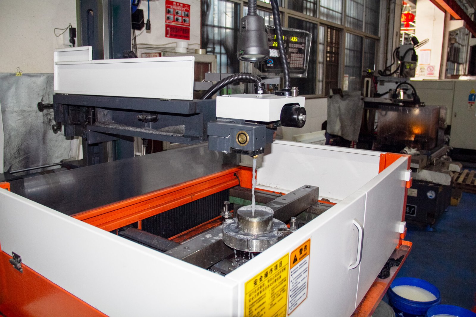 CNC wire-cut electrical discharge machine at WDL Valve factory